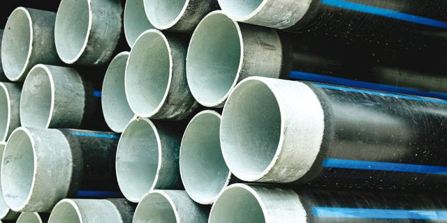Non alloyed steel pipes for the conveyance of water and other aqueos liquids